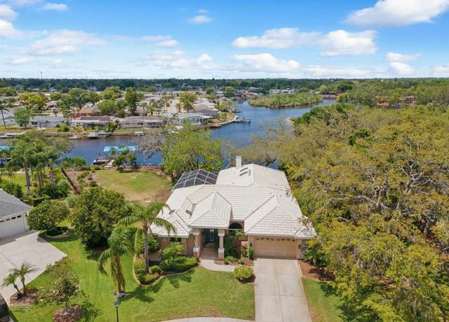 Property at 5903 Cachette DE Riviera Ct, New Port Richey, FL 34655, 4 beds, 3 baths
