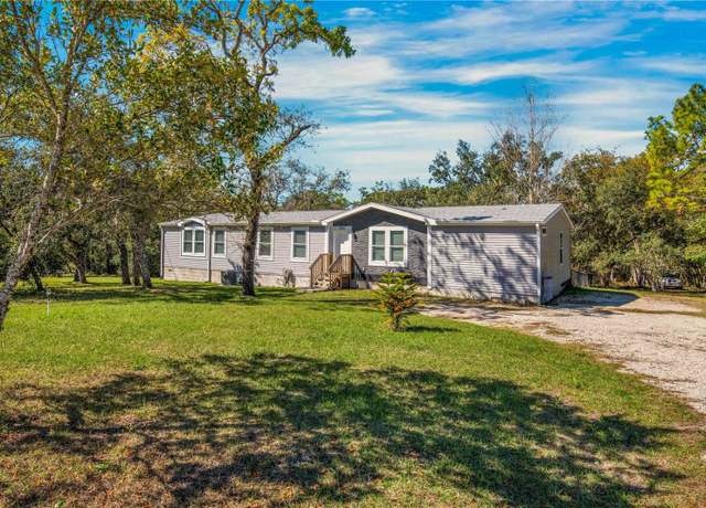 Property at 6111 Cartwrite Rd, Spring Hill, FL 34609, 4 beds, 3 baths