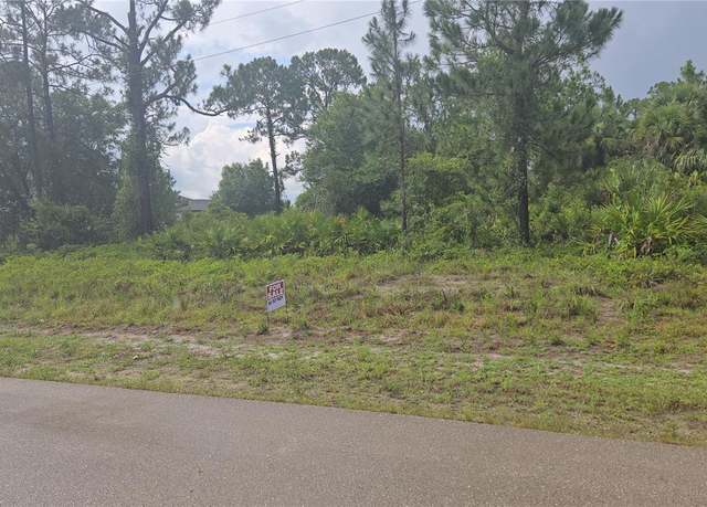 Property at 733 Palmer St E, Lehigh Acres, FL 33974