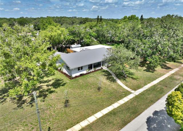 Property at 1510 Live Oak St, New Smyrna Beach, FL 32168, 4 beds, 3.5 baths