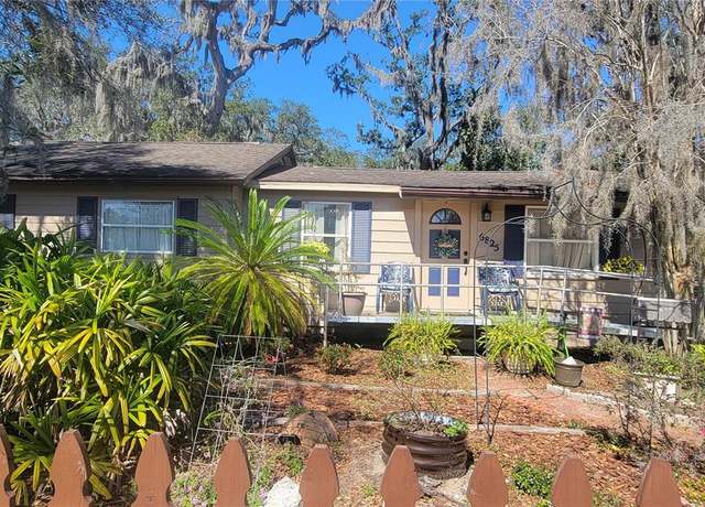 Property at 6825 Main St, New Port Richey, FL 34653, 6 beds, 3.5 baths