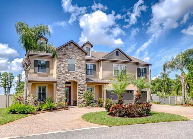Property at 2566 Lake Manor Dr, Land O Lakes, FL 34639, 5 beds, 5.5 baths