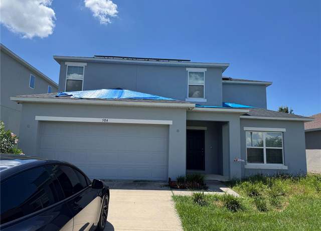 Property at 584 Black Eagle Dr, Groveland, FL 34736, 5 beds, 3 baths