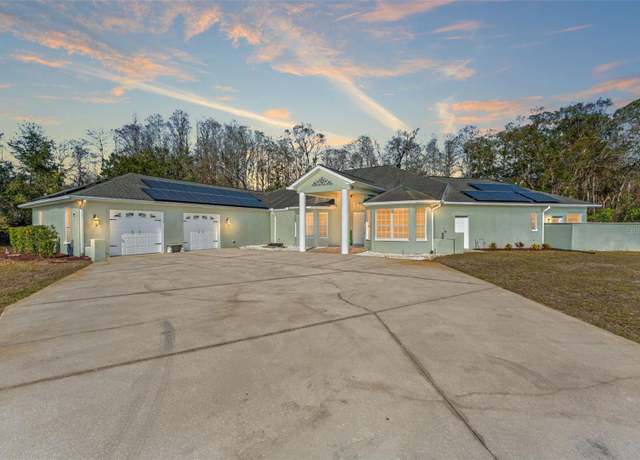 Property at 9911 Mendel Dr, New Port Richey, FL 34654, 4 beds, 3.5 baths