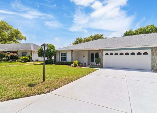 Property at 11015 Linkside Dr, Port Richey, FL 34668, 3 beds, 2 baths