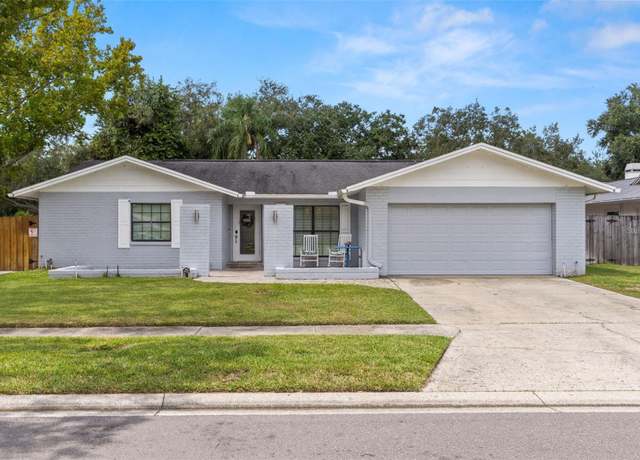 Property at 4221 Hollowtrail Dr, Tampa, FL 33624, 4 beds, 2 baths
