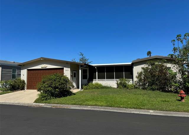 Property at 34303 Lodge Dr, Wesley Chapel, FL 33543, 3 beds, 2 baths