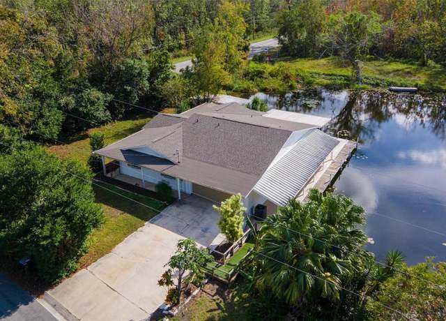 Property at 13724 Country Club Dr, Tavares, FL 32778, 3 beds, 2 baths