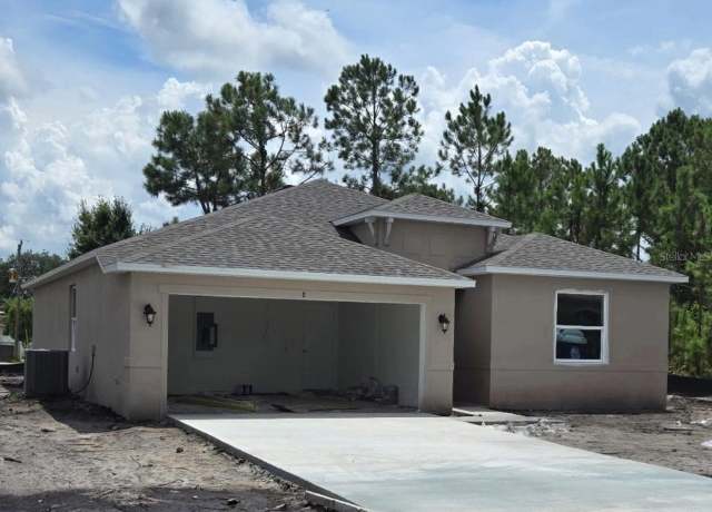 Property at 8 Fellowship Dr, Palm Coast, FL 32137, 4 beds, 2 baths