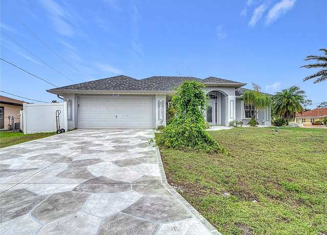 Property at 1007 Comstock St, Port Charlotte, FL 33952, 3 beds, 2 baths