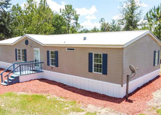 Property at 27913 SW 114th Pl, Newberry, FL 32669, 4 beds, 2 baths
