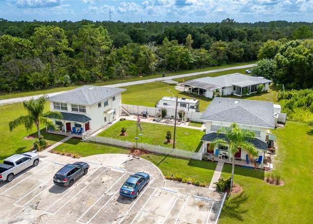 Property at 6900 Miami Dr, Indian Lake Estates, FL 33855, 4 beds, 4 baths