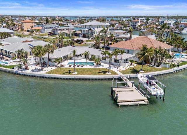 Property at 11050 7th St E, Treasure Island, FL 33706, 4 beds, 3 baths