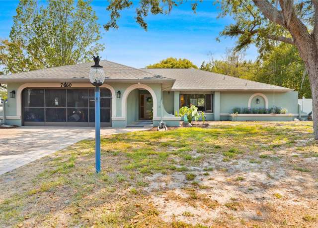 Property at 7660 Holiday Dr, Spring Hill, FL 34606, 4 beds, 3 baths