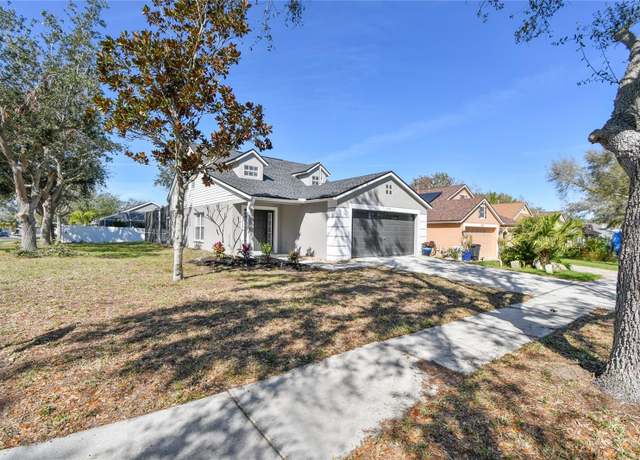 Property at 1764 Oak Spring Dr, Tarpon Springs, FL 34689, 4 beds, 2 baths
