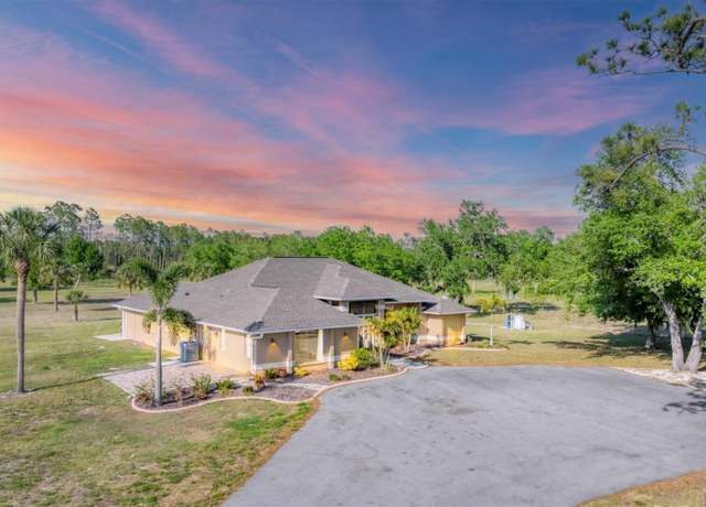 Property at 1668 Tropicaire Blvd, North Port, FL 34286, 4 beds, 3.5 baths