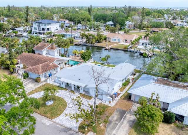 Property at 3941 14th Ln NE, St Petersburg, FL 33703, 4 beds, 3 baths