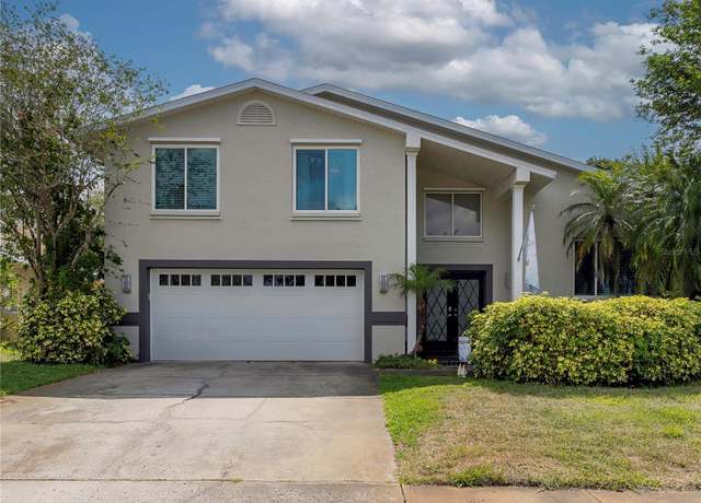 Property at 1326 Moss Dr, Dunedin, FL 34698, 5 beds, 3 baths