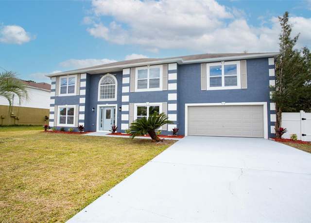 Property at 73 London Dr, Palm Coast, FL 32137, 5 beds, 3 baths
