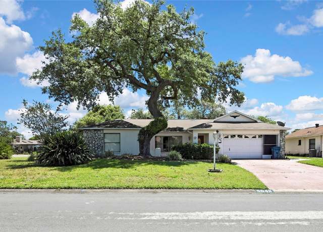Property at 5042 Gaston St, Spring Hill, FL 34607, 3 beds, 3 baths