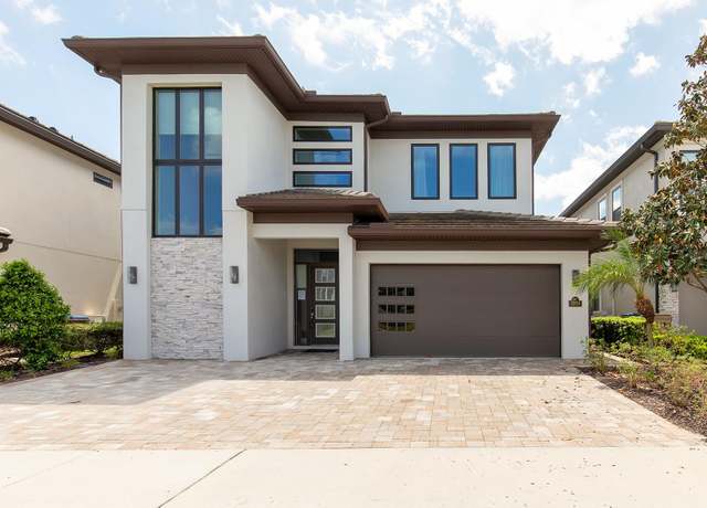 Property at 7928 Jacks Club Dr, Kissimmee, FL 34747, 5 beds, 6 baths