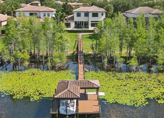 Property at 7624 Pointe Venezia Dr, Orlando, FL 32836, 6 beds, 6 baths