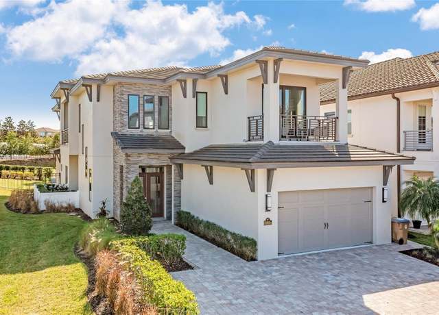 Property at 985 Jack Nicklaus Ct, Kissimmee, FL 34747, 5 beds, 5.5 baths