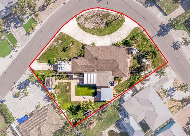 Property at 911 Boca Ciega Isle Dr, St Pete Beach, FL 33706, 3 beds, 2.5 baths