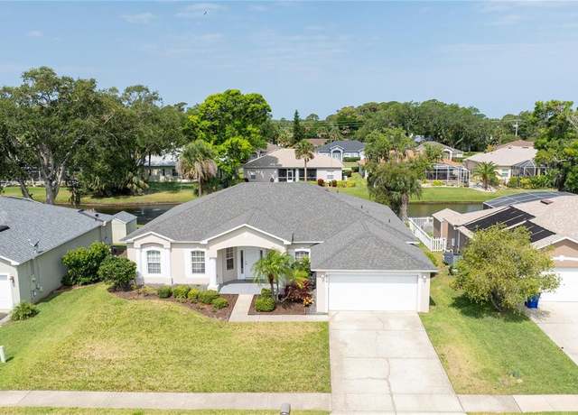 Property at 404 Central Mariners Dr, Edgewater, FL 32141, 4 beds, 2 baths