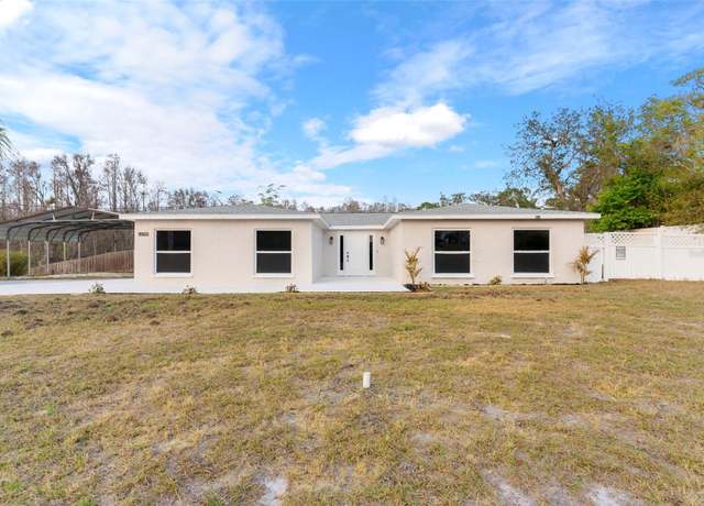 Property at 9505 Delray Dr, New Port Richey, FL 34654, 4 beds, 3 baths