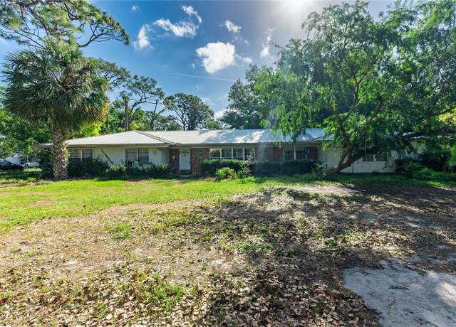 Property at 5820 20th St, Zephyrhills, FL 33542, 4 beds, 2.5 baths