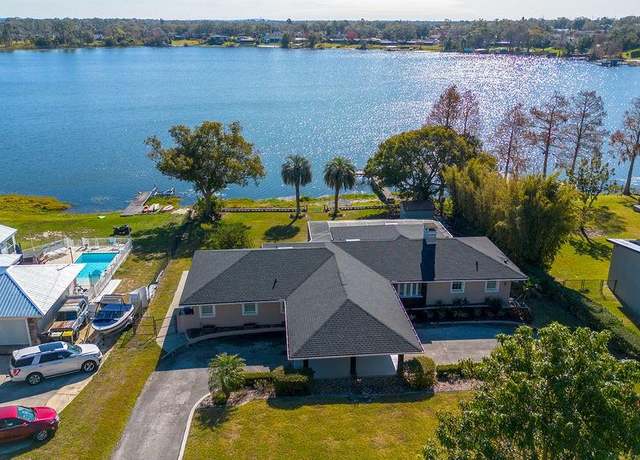 Property at 115 N Lake Florence Dr, Winter Haven, FL 33884, 4 beds, 3.5 baths