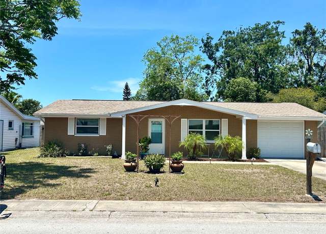 Property at 7861 Raintree Dr, New Port Richey, FL 34653, 3 beds, 2 baths