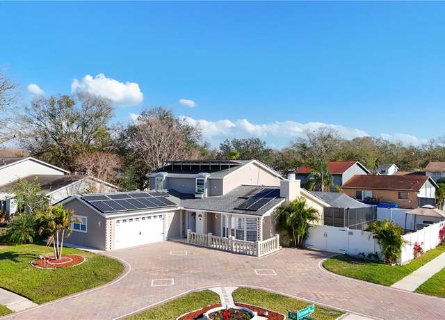 Property at 15701 Springmoss Ln, Tampa, FL 33624, 4 beds, 3.5 baths