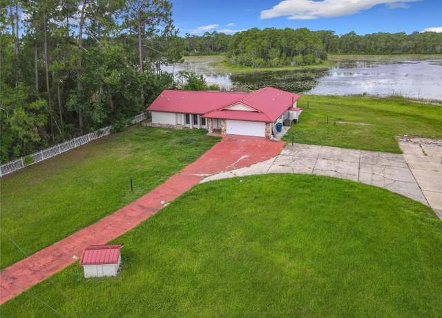 Property at 318 Mitnik Dr, Deltona, FL 32738, 4 beds, 4 baths