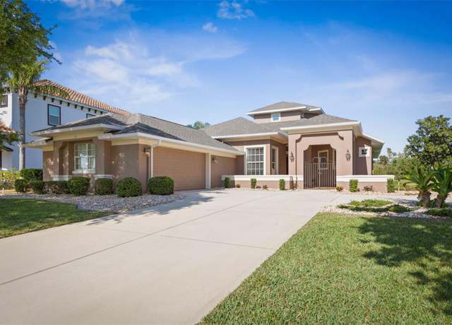 Property at 65 Heron Dr, Palm Coast, FL 32137, 4 beds, 3 baths