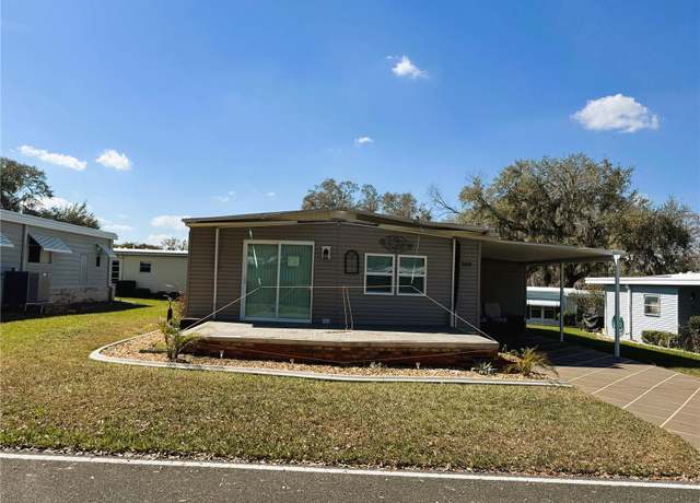 Property at 100 Papaya Cv, Leesburg, FL 34748, 2 beds, 2 baths