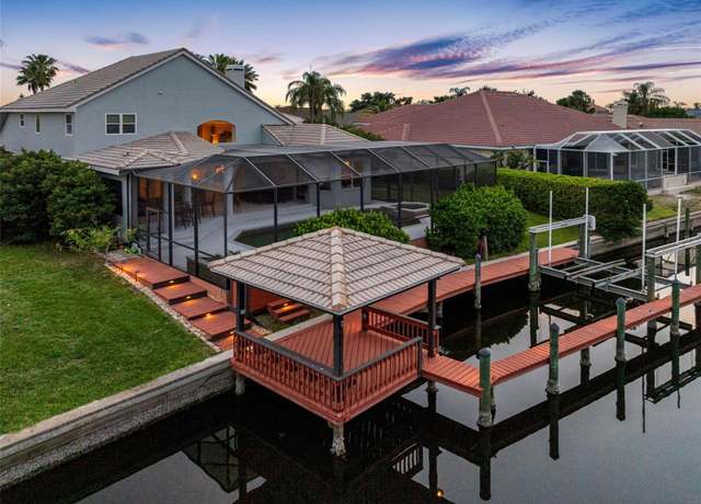 Property at 5510 E Longboat Blvd, Tampa, FL 33615, 5 beds, 4.5 baths