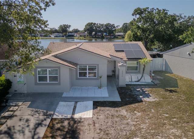 Property at 12416 Queensland Ln, Tampa, FL 33625, 4 beds, 2 baths
