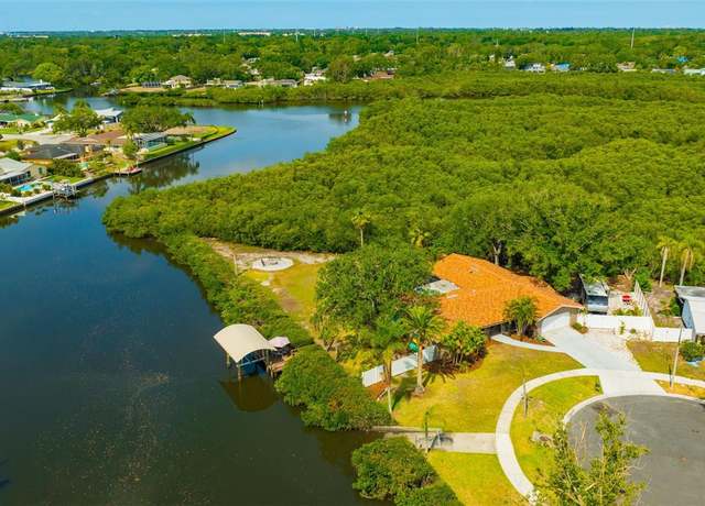 Property at 1890 Wateroak Dr W, Clearwater, FL 33764, 4 beds, 2 baths