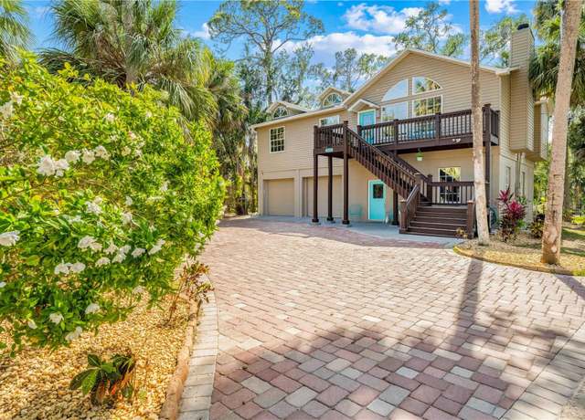 Property at 8711 Betty St, Port Richey, FL 34668, 4 beds, 3 baths