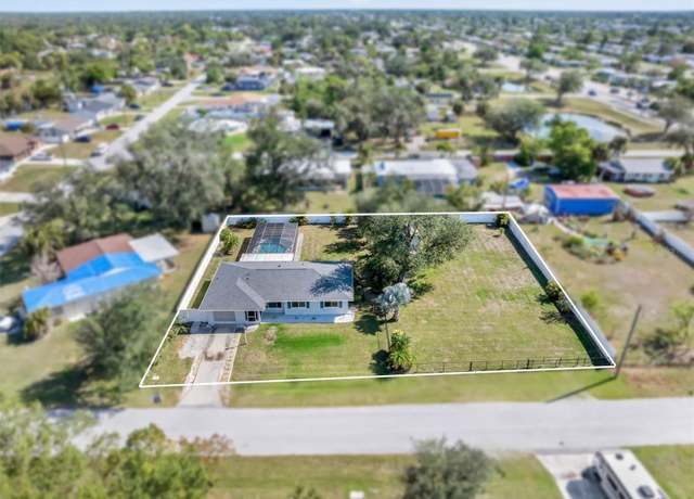 Property at 2102 Alaric St, Port Charlotte, FL 33952, 3 beds, 2 baths
