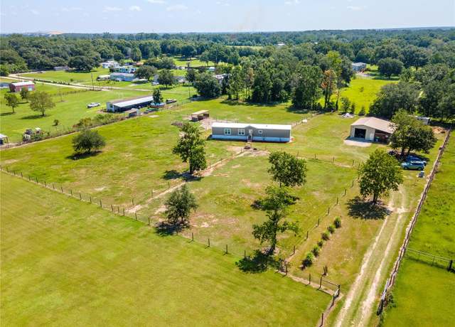 Property at 8736 23rd St, Zephyrhills, FL 33540, 2 beds, 2 baths