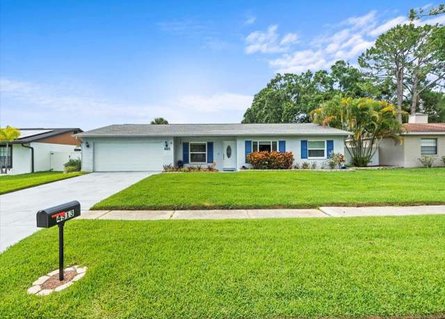Property at 4313 Hollow Hill Dr, Tampa, FL 33624, 3 beds, 2 baths