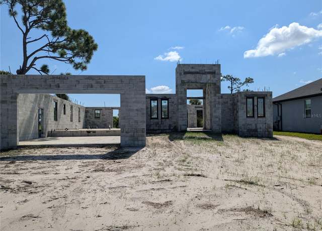 Property at 260 Tournament Rd, Rotonda West, FL 33947, 4 beds, 4 baths