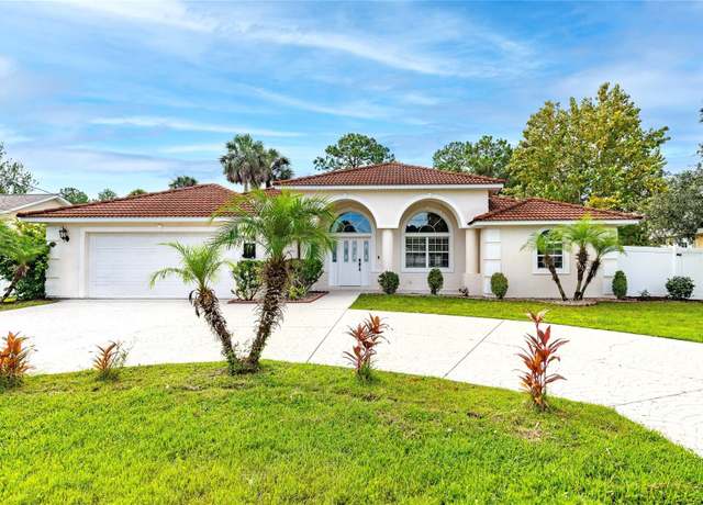 Property at 34 Pritchard Dr, Palm Coast, FL 32164, 4 beds, 3 baths