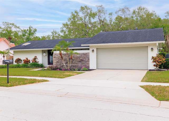 Property at 9626 Leeward Ave, Largo, FL 33773, 4 beds, 3 baths