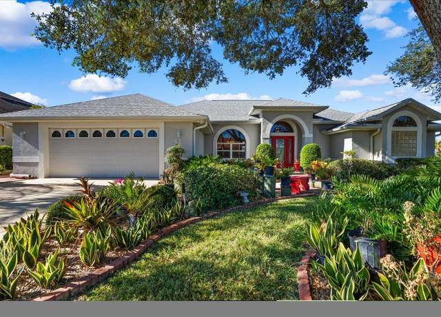 Property at 43 Clarendon Ct N, Palm Coast, FL 32137, 4 beds, 2.5 baths