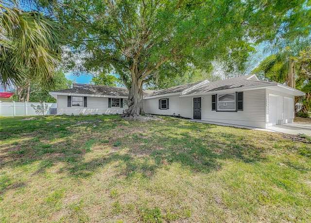 Property at 2050 Broken Arrow Trl N, Lakeland, FL 33813, 4 beds, 2 baths