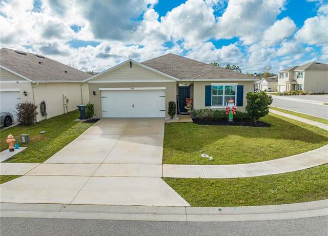 Property at 1242 Iguana Loop, Davenport, FL 33897, 4 beds, 2 baths